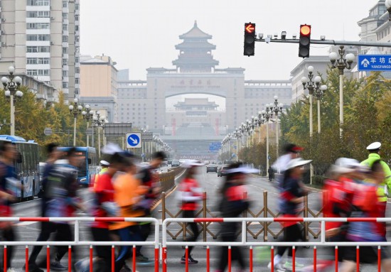 奔跑，繪就城市靚麗的風景——從北京馬拉松看全民健身熱潮