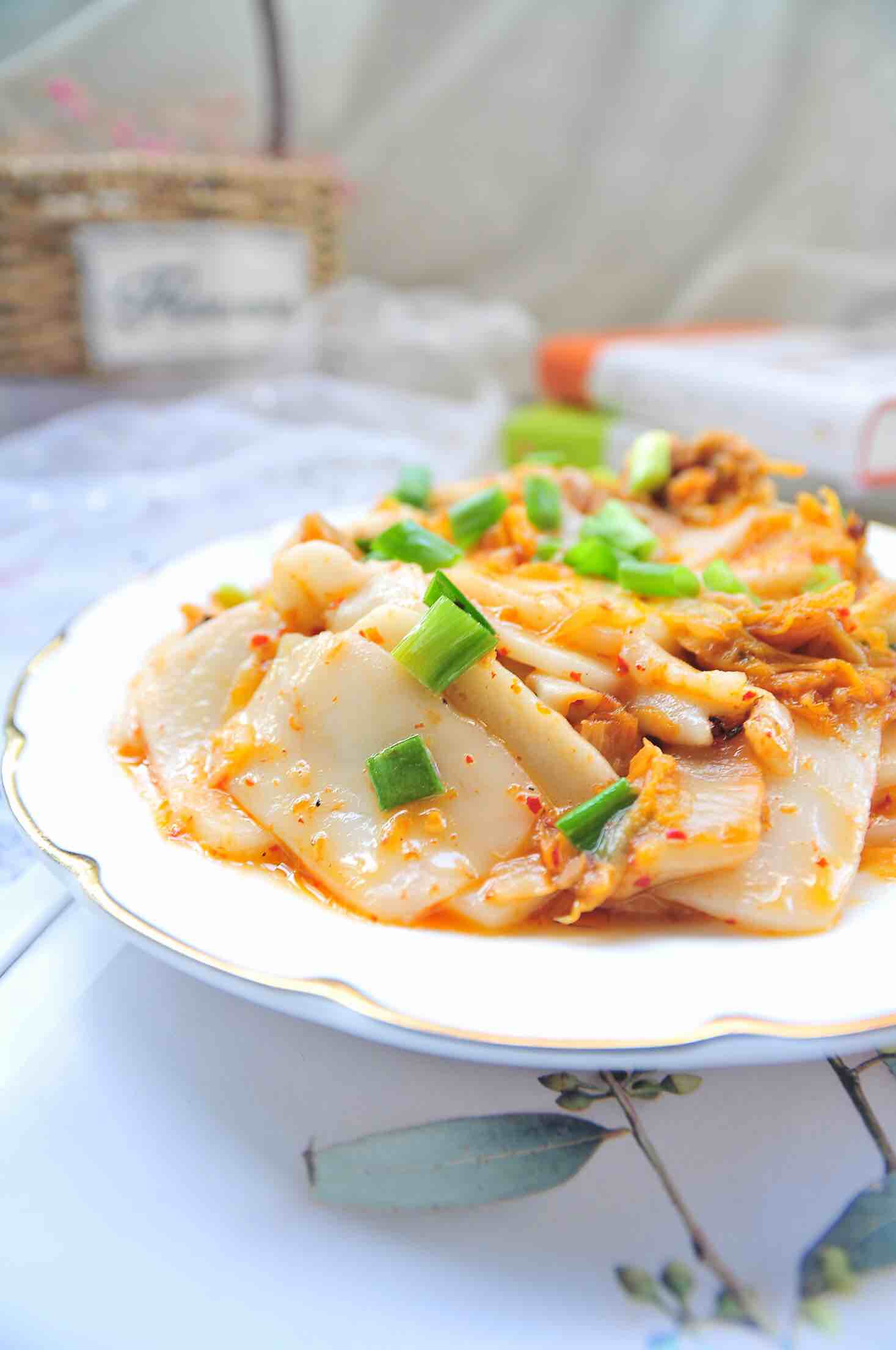 辣白菜炒年糕的做法-家常味炒菜譜-易網健康養生網 辣白菜炒年糕的做法-家常味炒菜譜