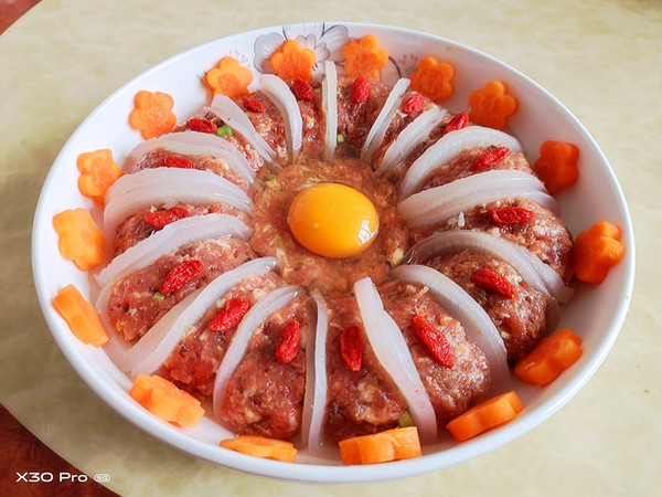 花開(kāi)富貴（蘿卜蒸肉）的做法-咸鮮味蒸菜譜